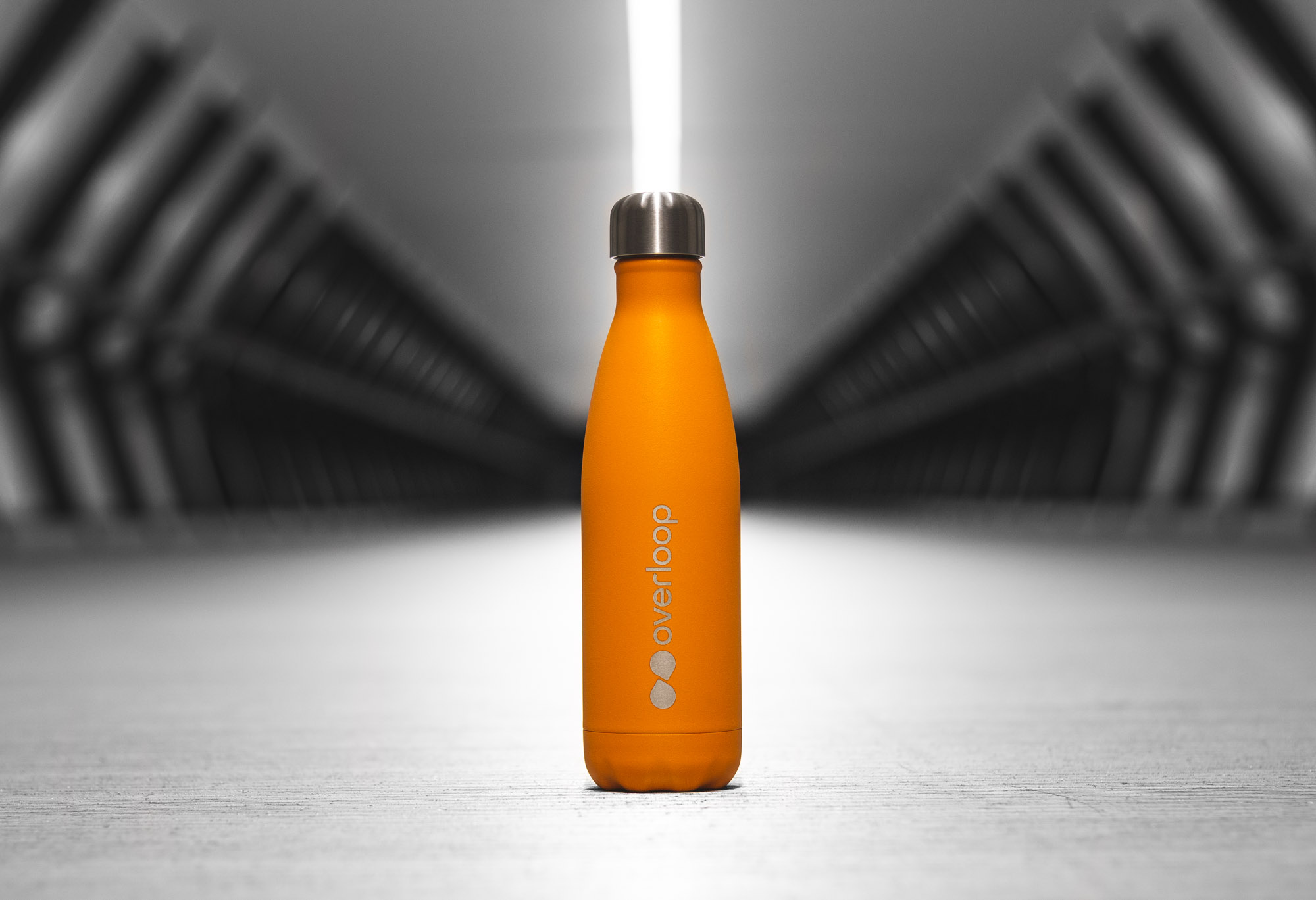 Overloop brand closing shot with mark and wordmark in full palette