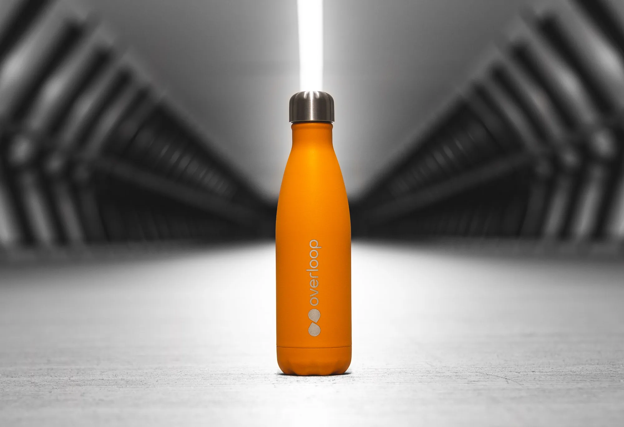 Overloop brand closing shot with mark and wordmark in full palette