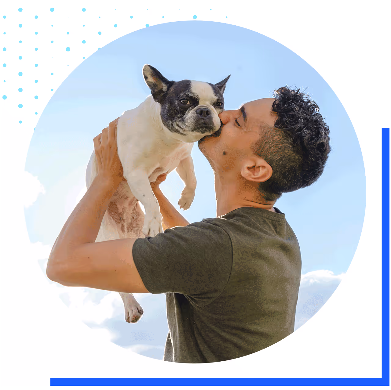 A male pet parent holding up his boston terrier dog evoking happy feeling