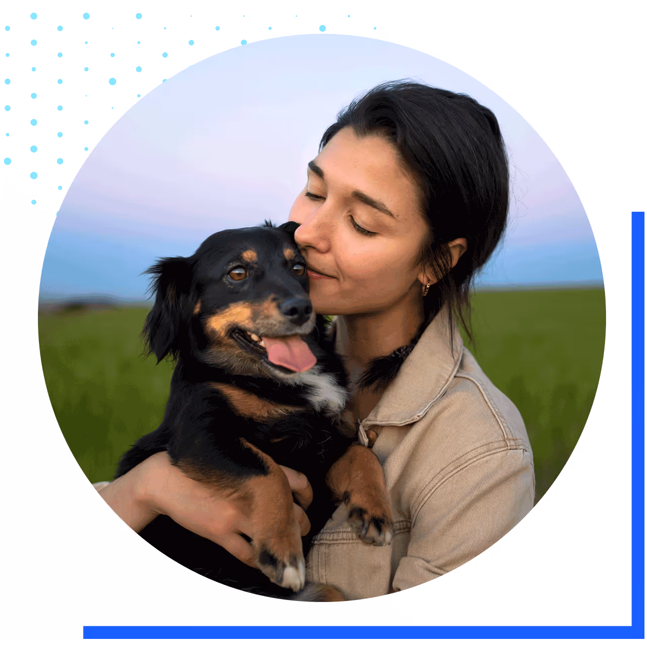 A woman gently holding her dog