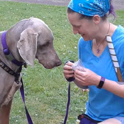 Photo of Mary Ellen and Skye the dog together