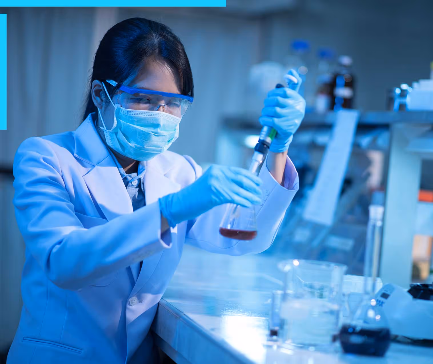 A female scientist conducting an experiment in a lab setting