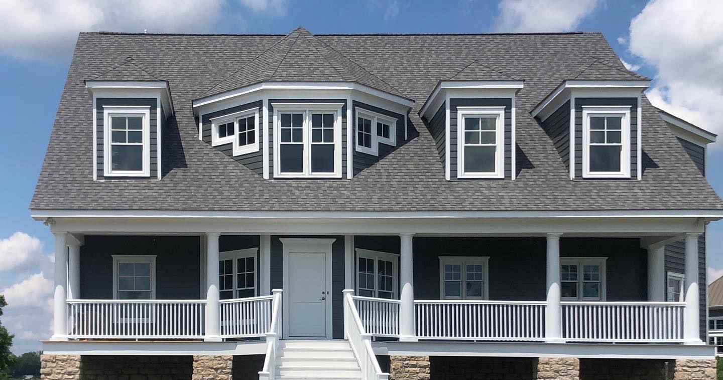 big house that was repainted. before and after