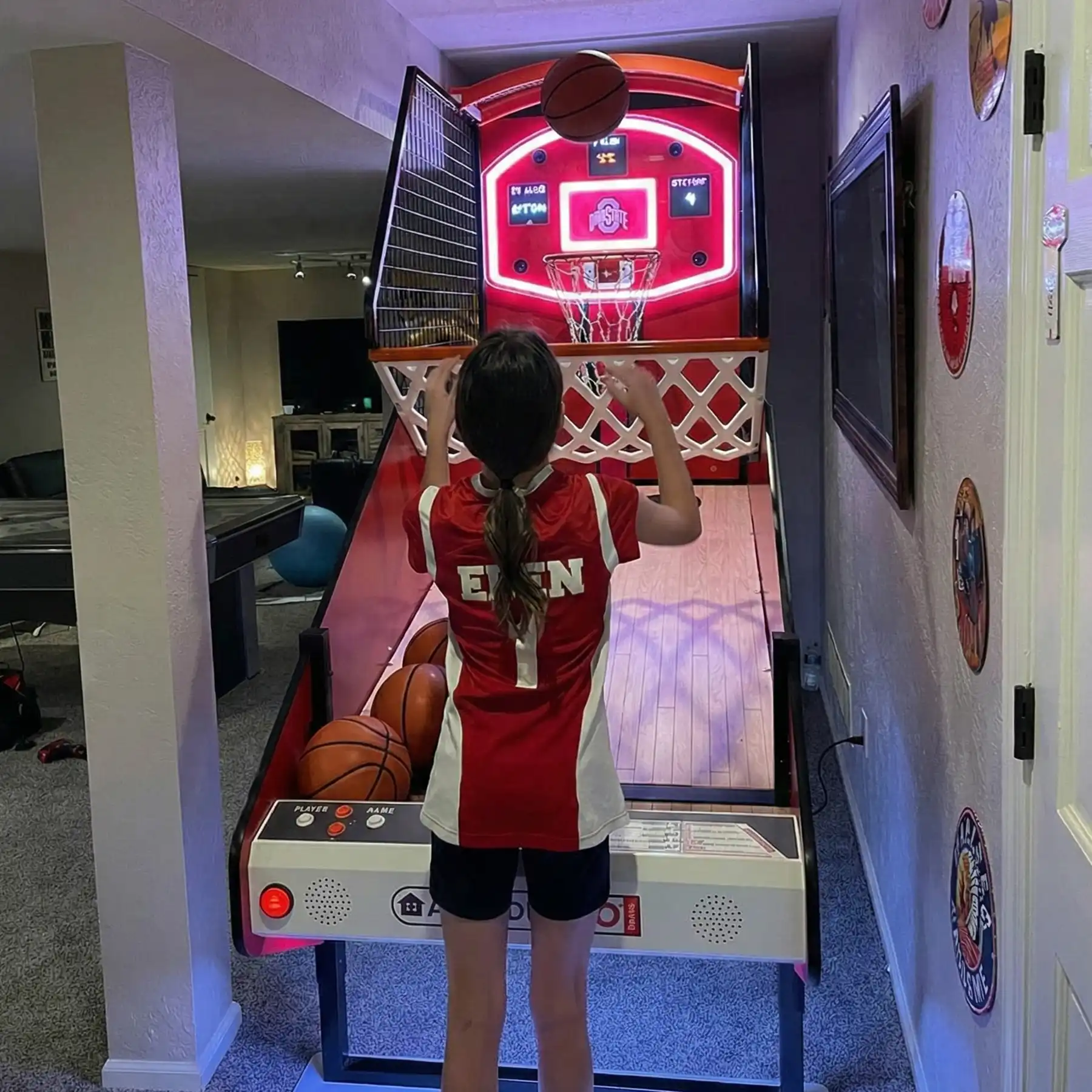 Arcade Pro NBA home basketball game with electronic scoring, heavy-duty orange netting, and official logos for any fan's room.