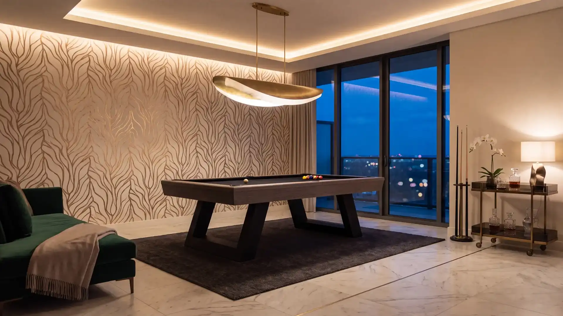 Modern luxury pool table with black felt under a curved brass pendant light in a chic high-rise game room with city night views.