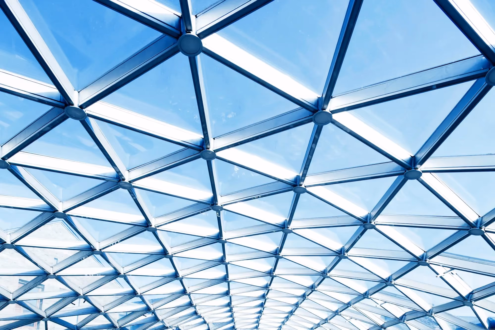 A long walkway with a skylight in the background