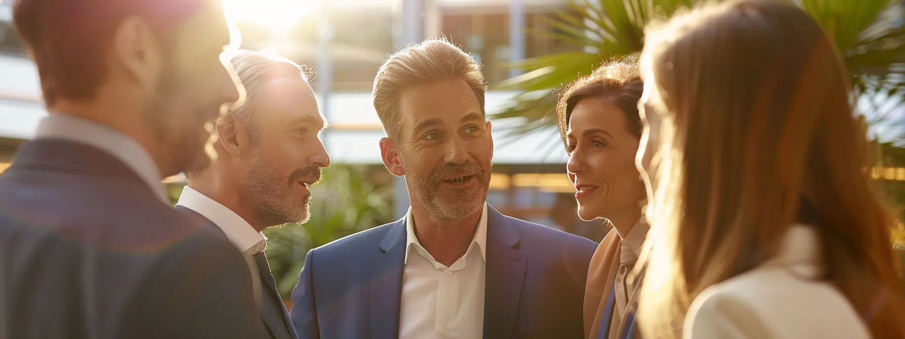 a group of business professionals discussing the benefits of hiring a las vegas car accident attorney.