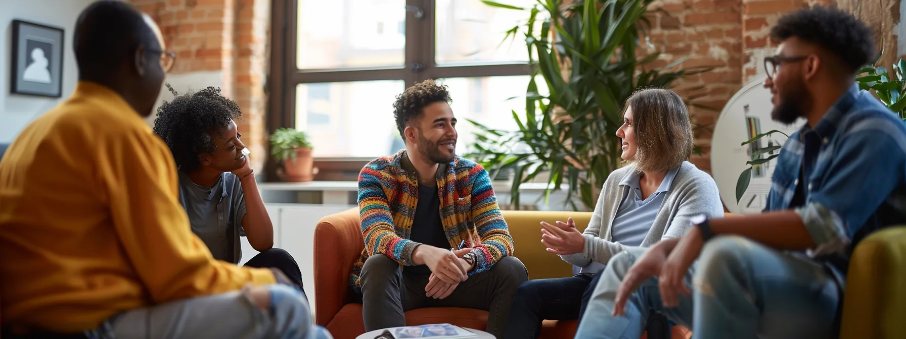 diverse group of professionals discussing mental health initiatives in baltimore community setting.