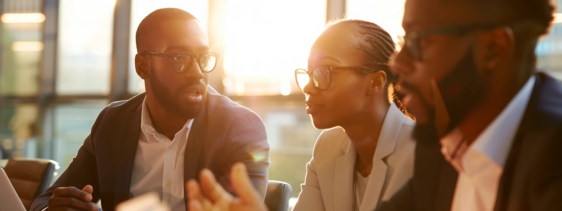 a group of business professionals discussing the benefits of streamlining payment processes with cheques.