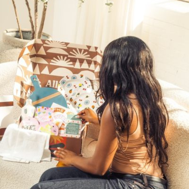 Open Alltrue box wit home wares, accessories, low waste lifestyle goods and more