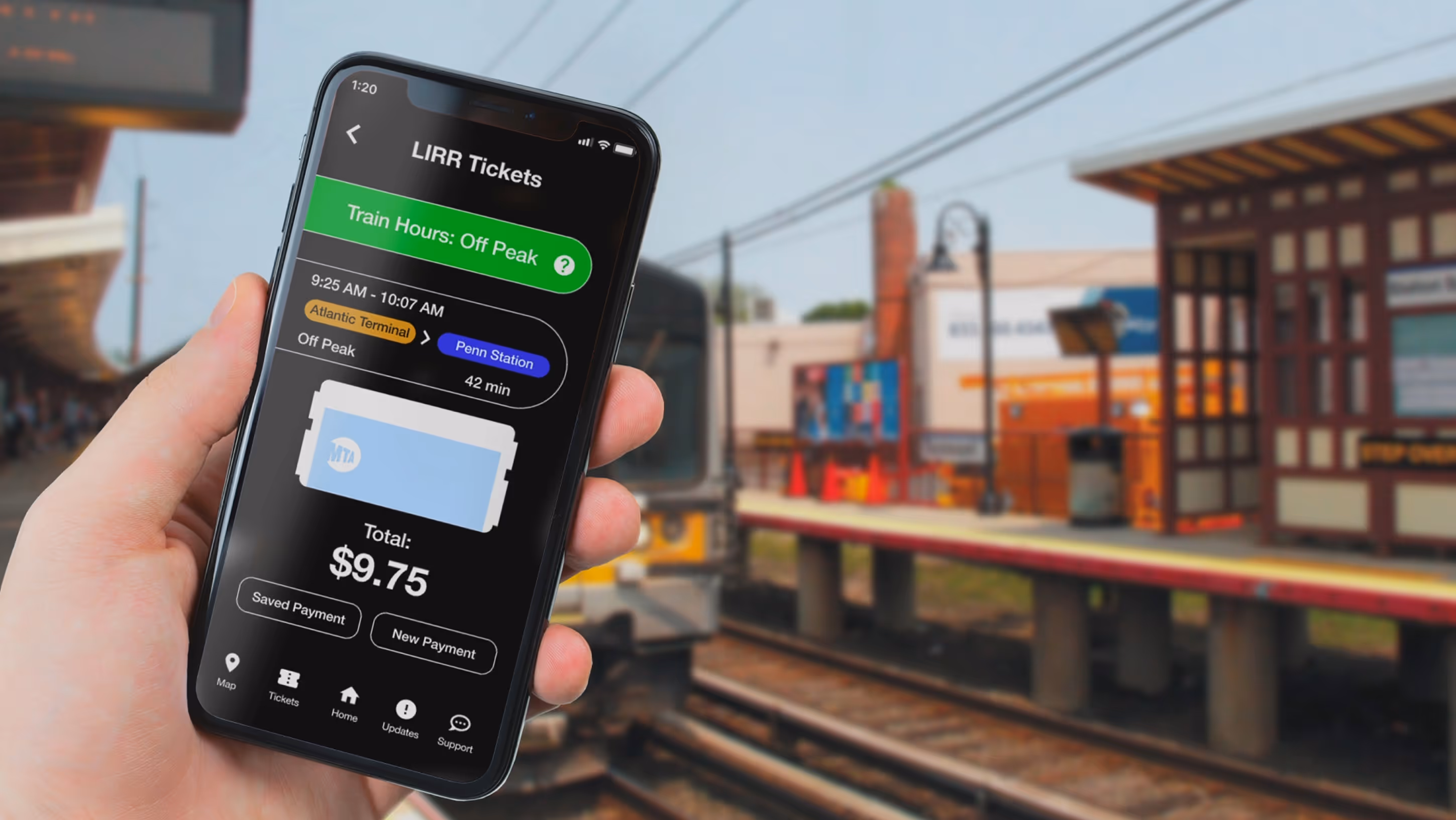 Hand holding phone with MTA riders app concept showcasing LIRR tickets outside at a LIRR station