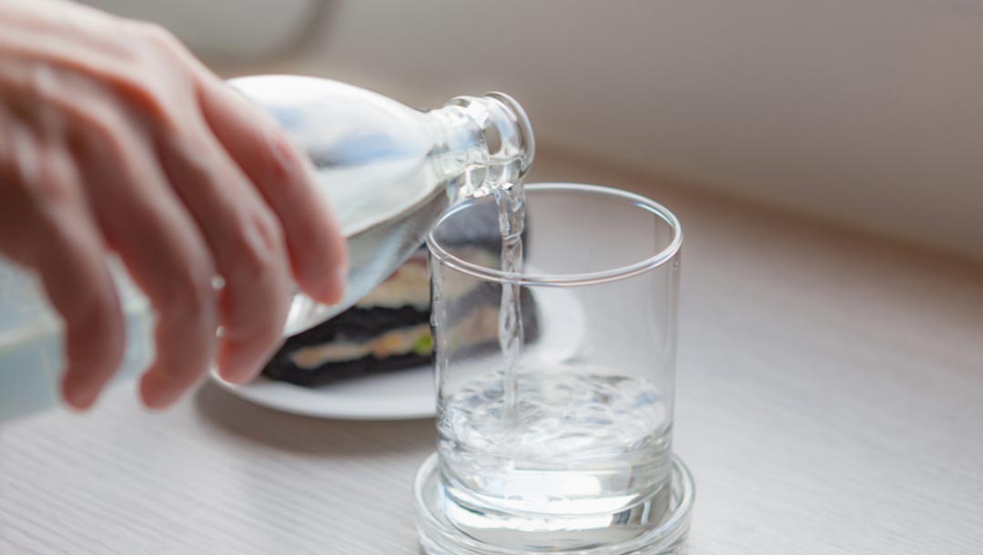 UK Vein Clinic - Man pouring water