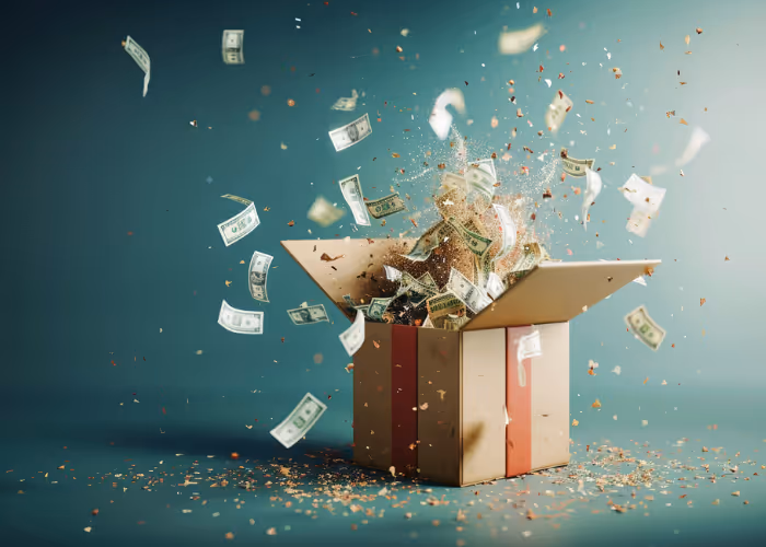 Eine mit Geldscheinen explodierende Box