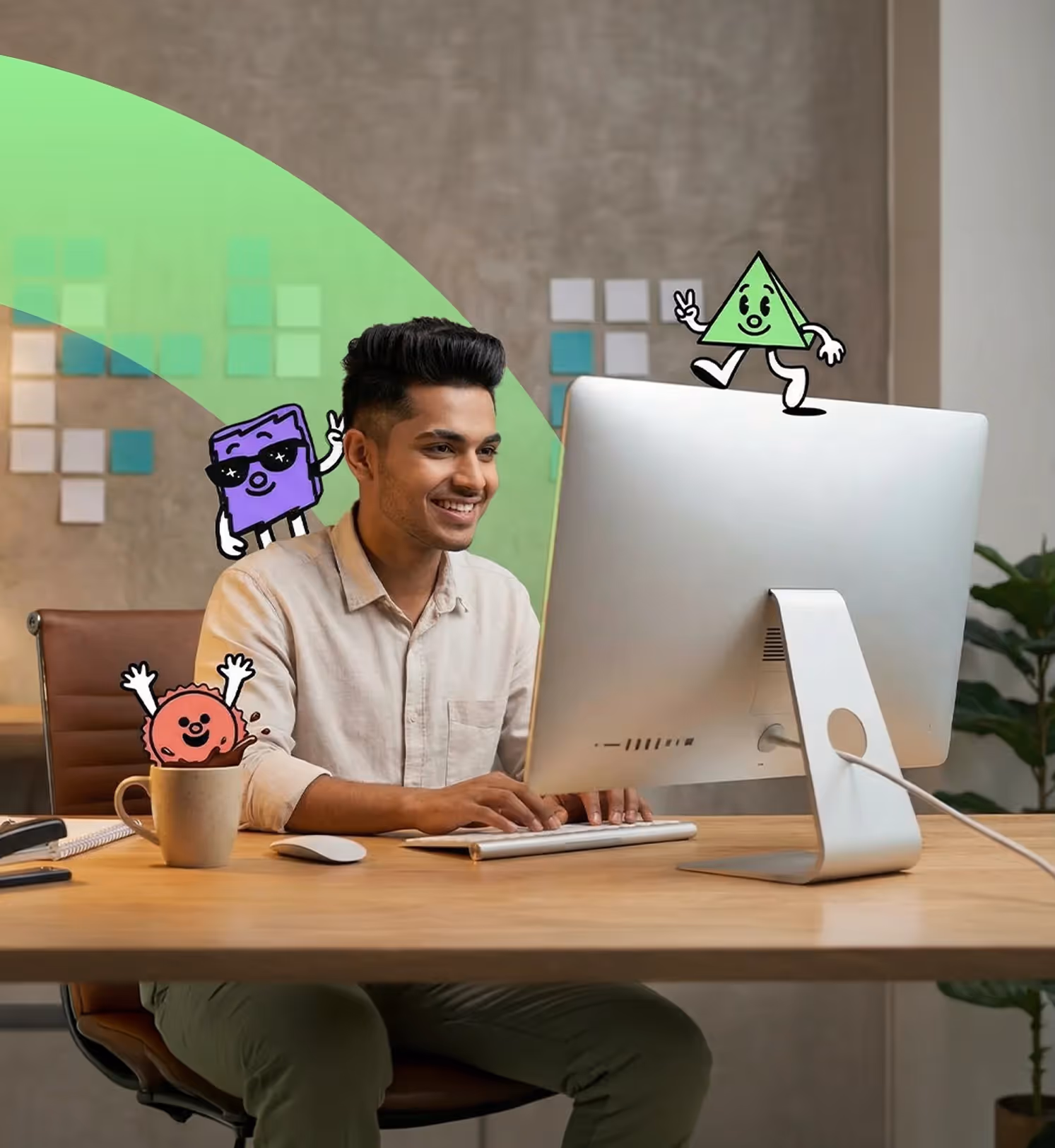 Smiling man working on a desktop computer at a desk with colorful cartoon characters around him.