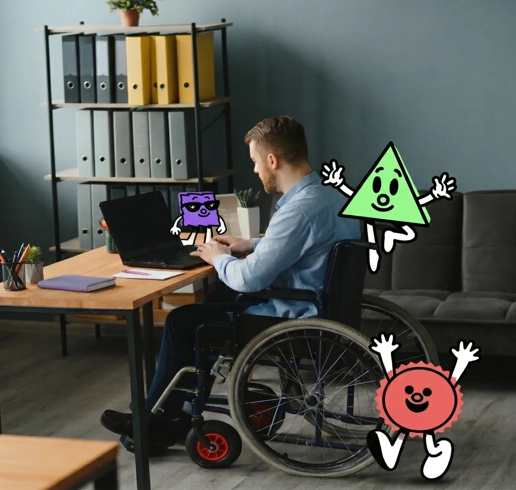 Man in wheelchair working on laptop at desk with cheerful cartoon shapes around him.