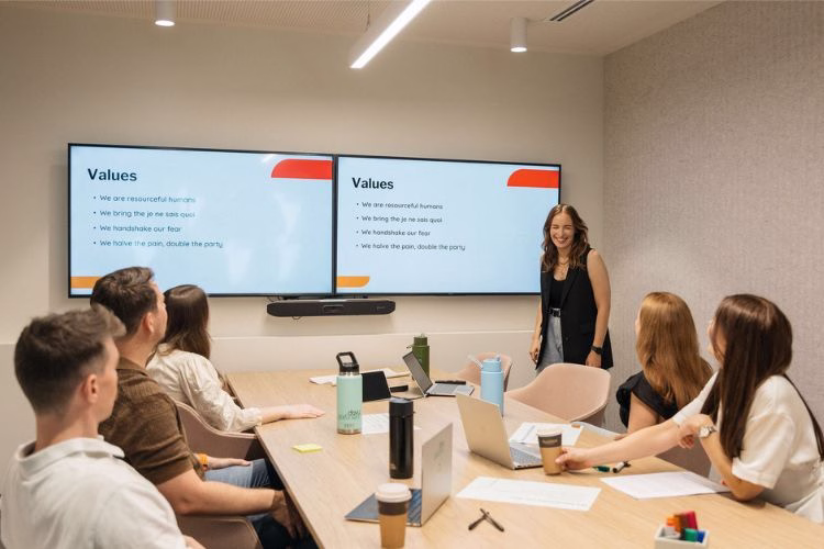 HR Team presenting about values and team culture