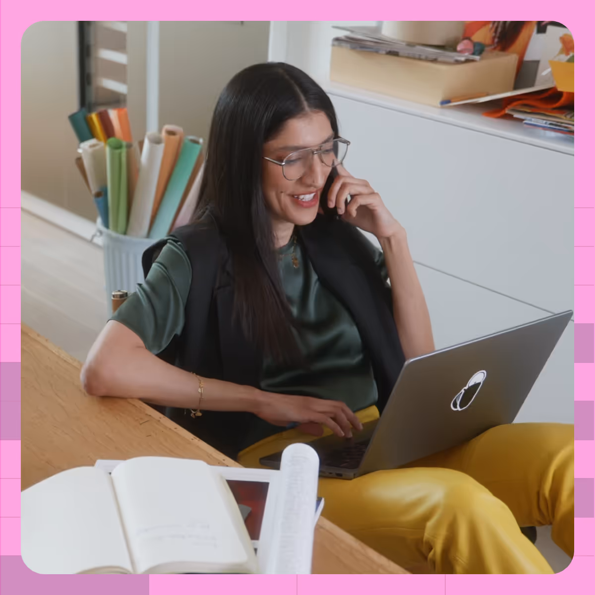 Woman smiling on a video call, sitting comfortably on a office space