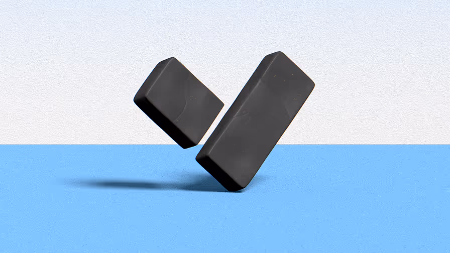 Two black rectangular blocks floating above a blue surface casting shadows.