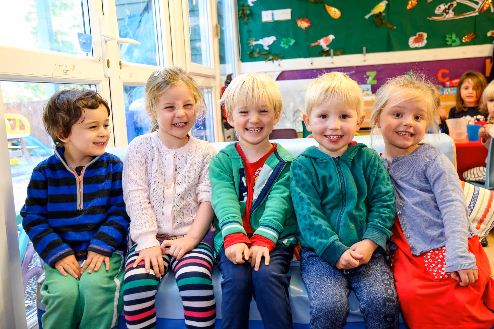Group of children smiling at the camera