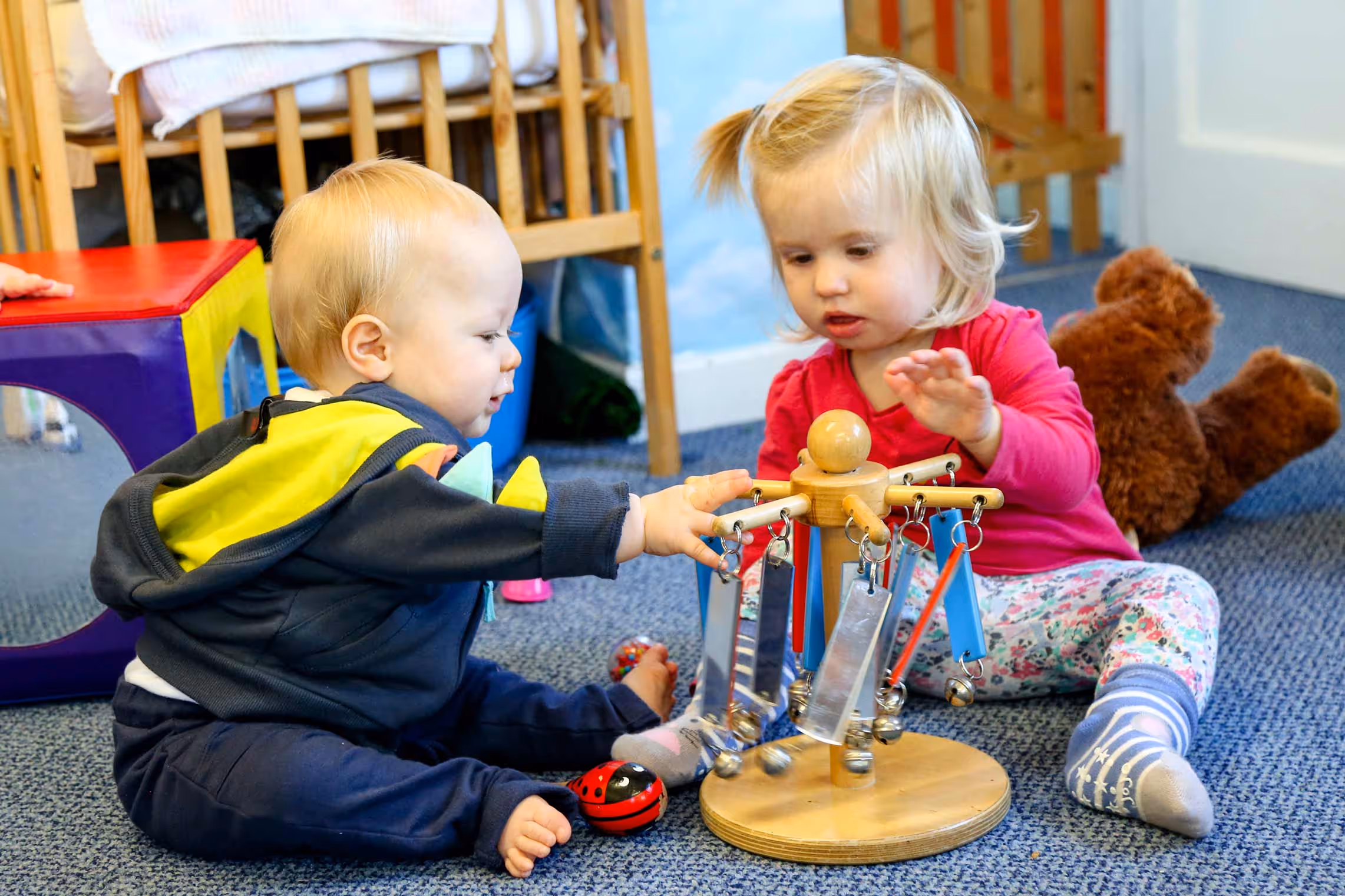 Two kids playing games with each other