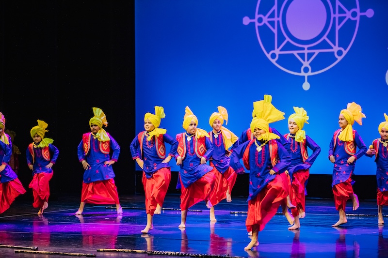 Boys dancing Punjabi folk dance