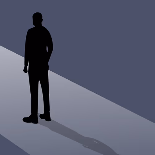 Silhouette of a person standing in a large space with light coming through an open doorway, symbolizing opportunity or direction.