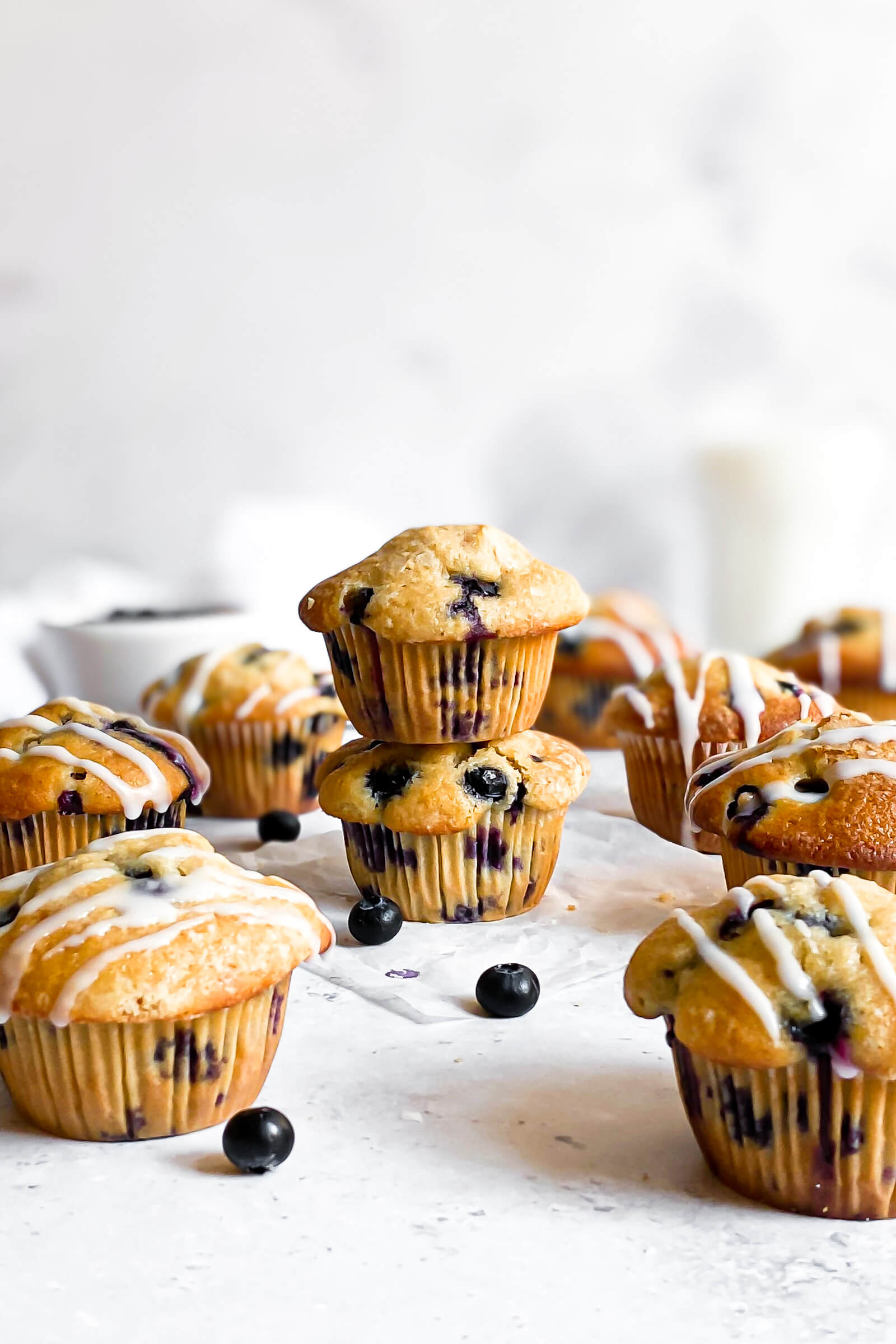 Bakery Style Blueberry Muffins With Lemon Glaze