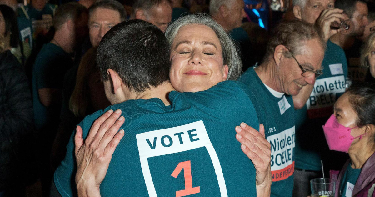 Nicollete Boele hugging a supporter on election night.