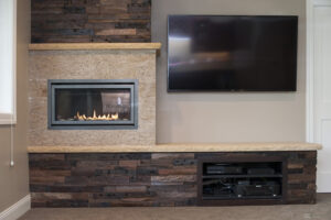 Basement Reclaimed wood with fireplace stone