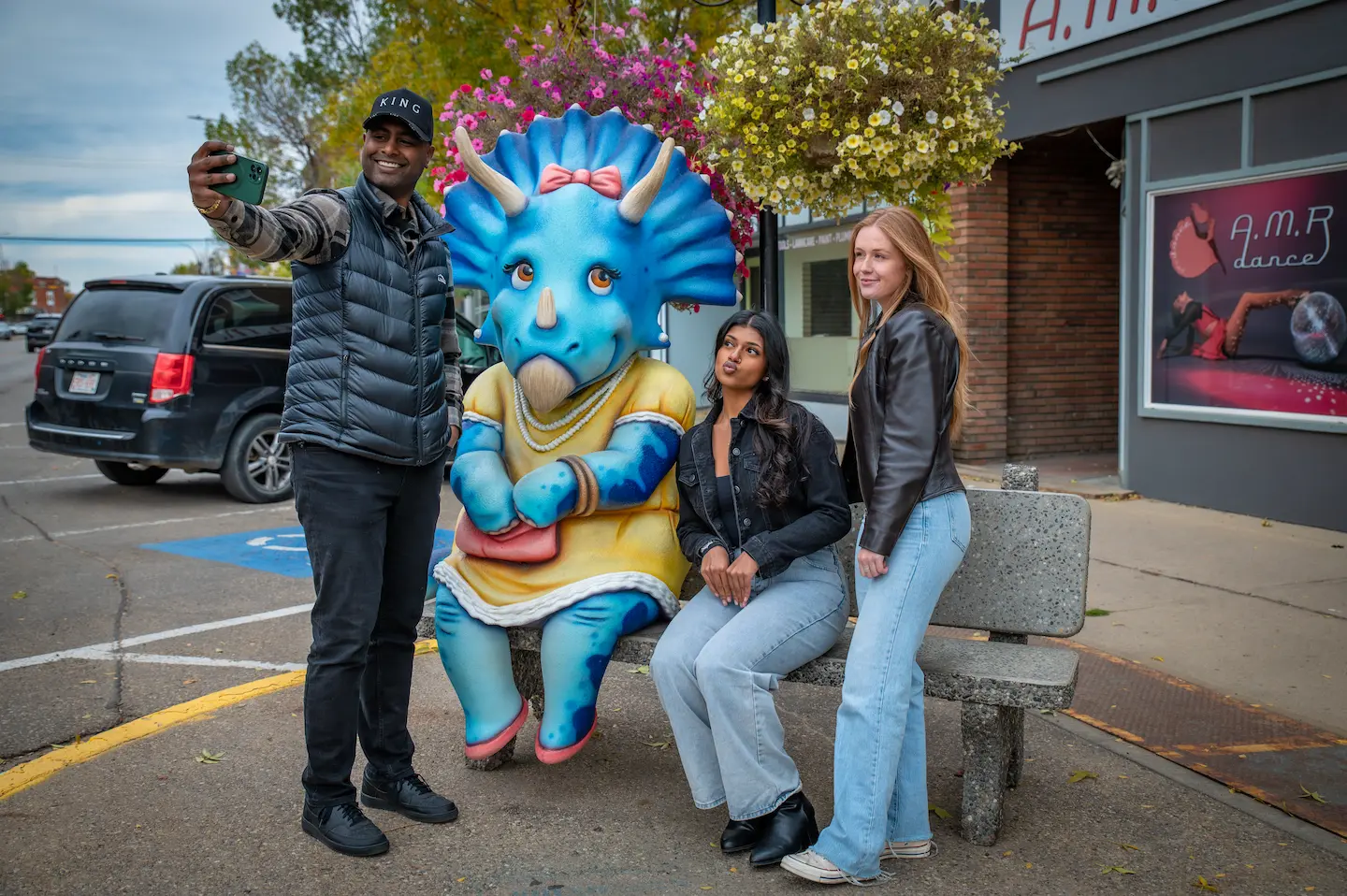 A image of people with a dinosaur