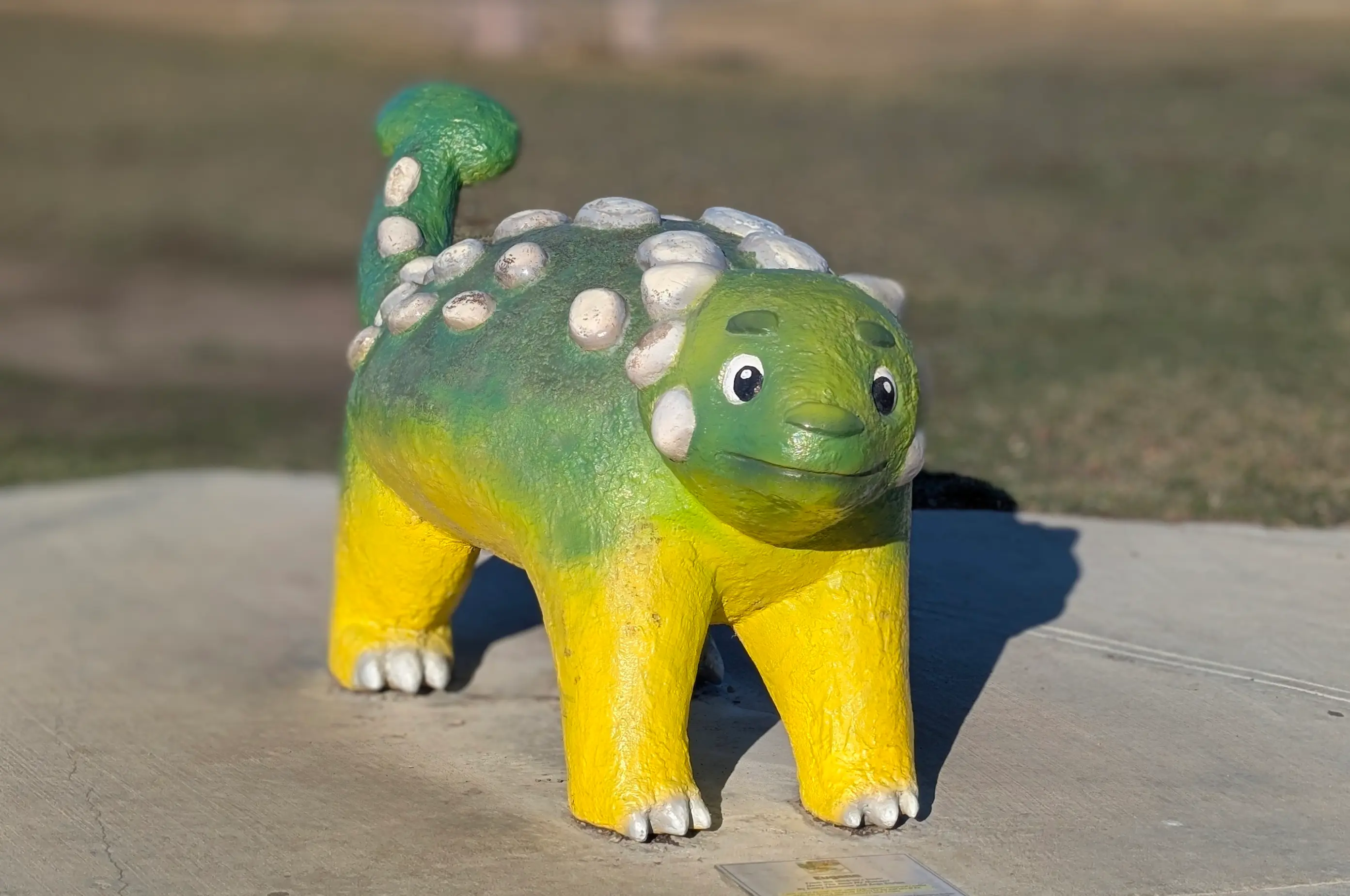 A image of a dinosaur statue Eugene