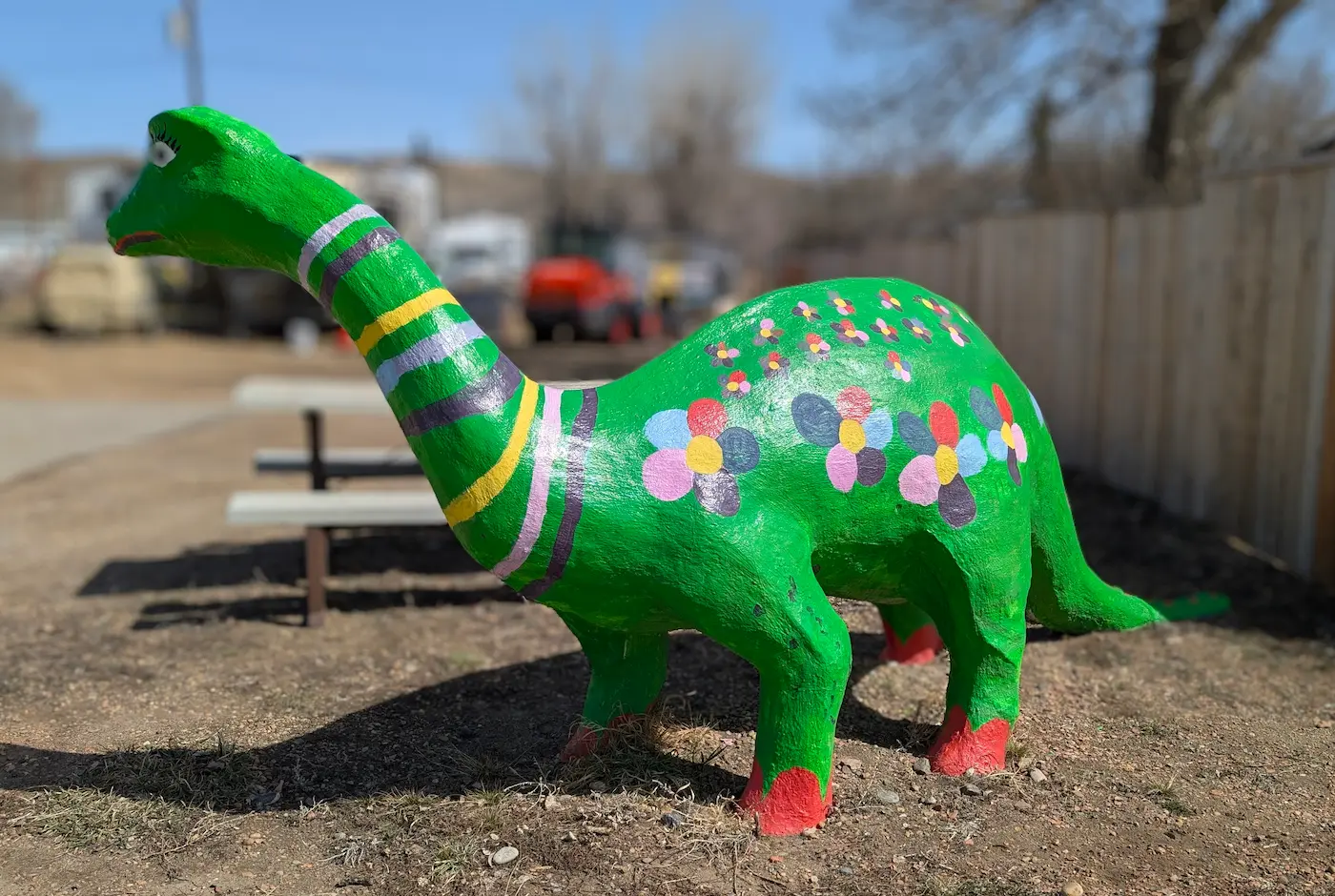 A image of a dinosaur statue Rosie