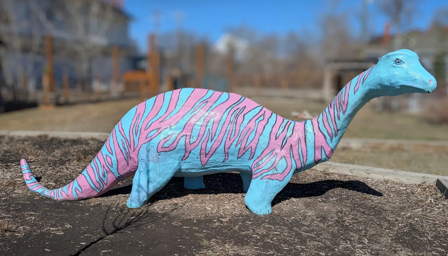 A image of a dinosaur statue Mervin