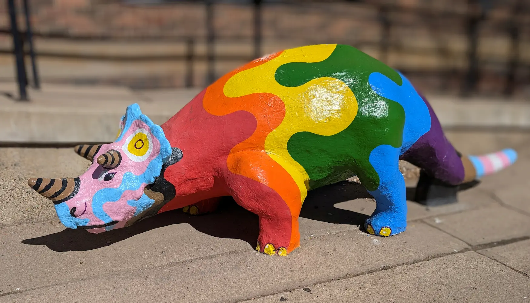 A image of a dinosaur statue Pride