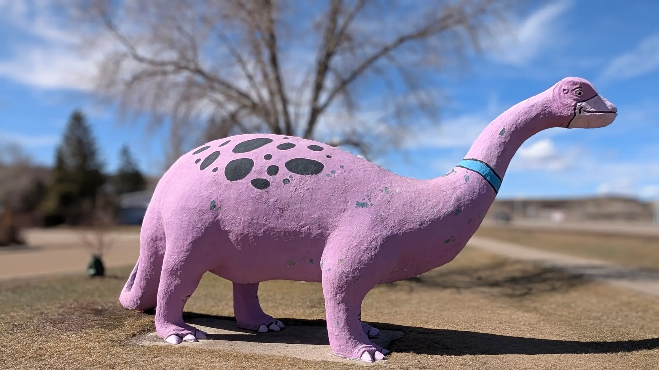 A image of a dinosaur statue Beano