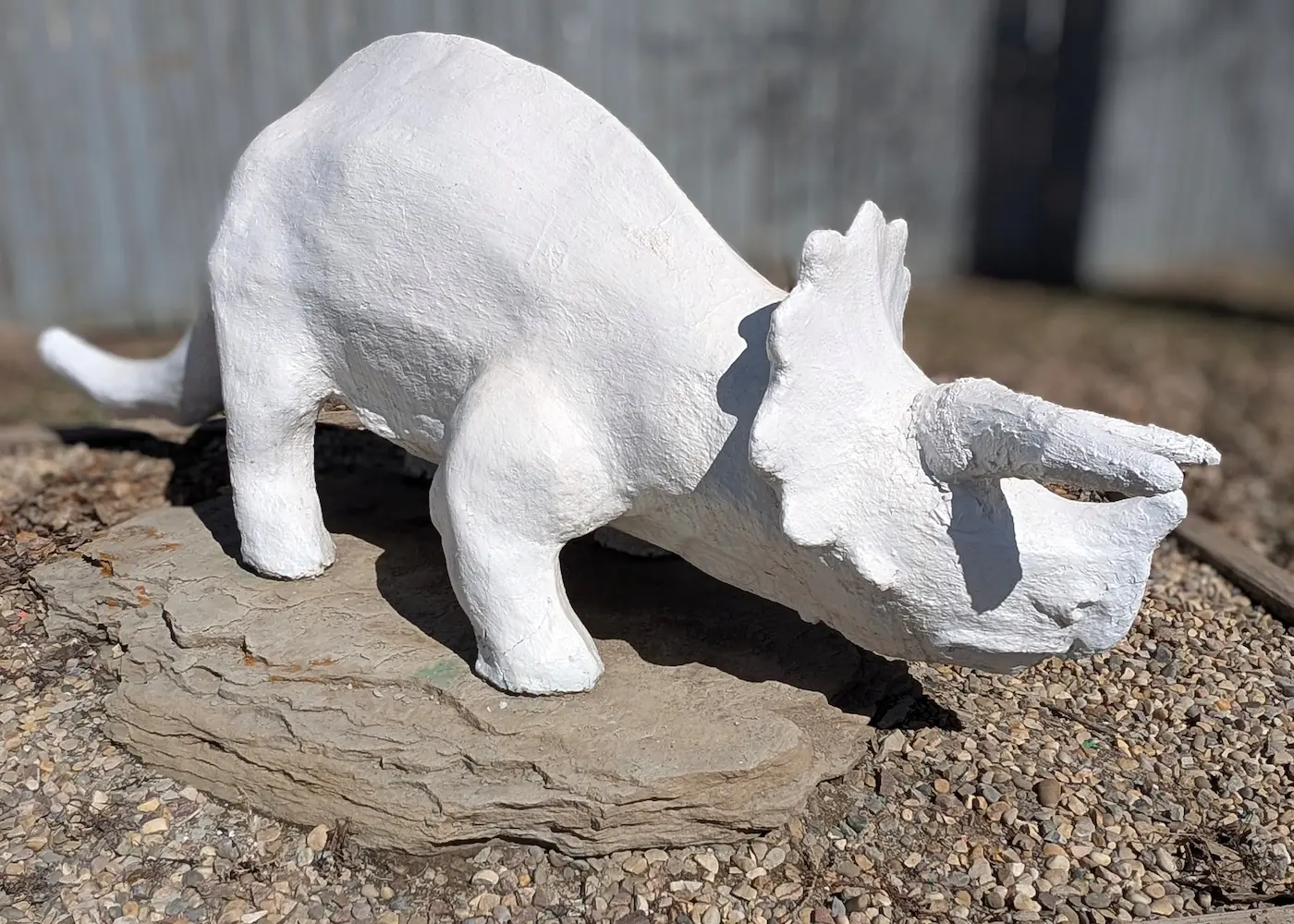 A image of a dinosaur statue Bingo