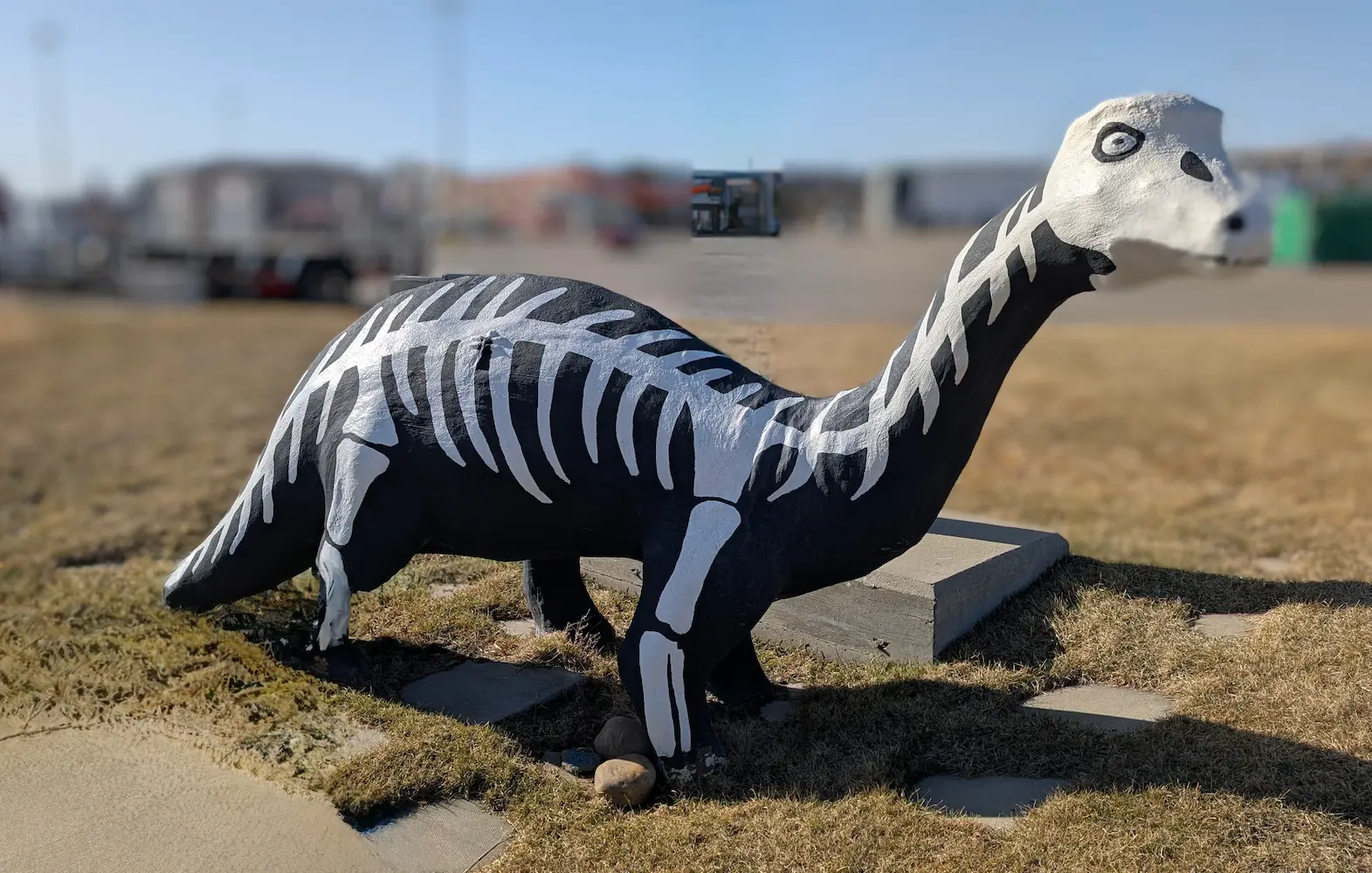 A image of a dinosaur statue Bronco