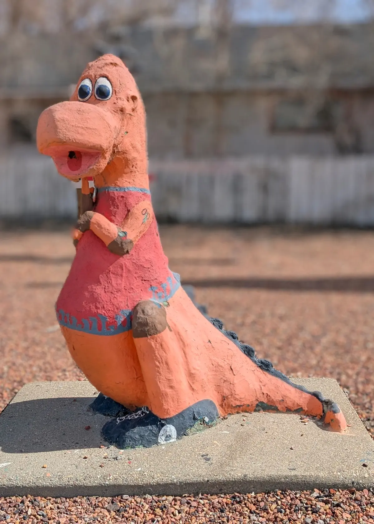 A image of a dinosaur statue Huey