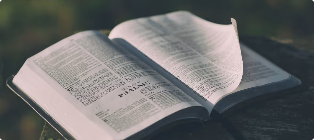 image of the Bible opened at page "The Book of PSALMS"