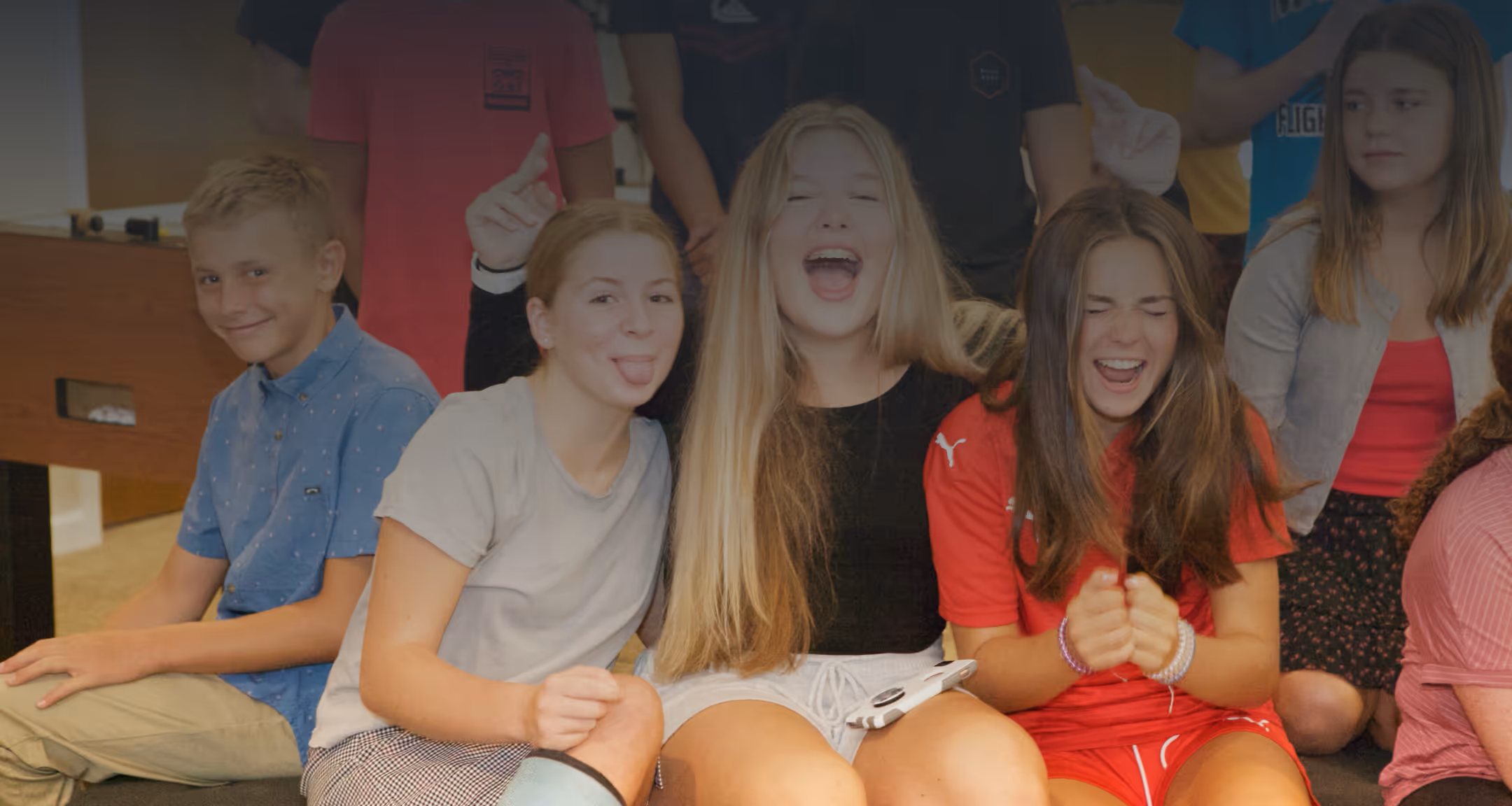 a group of teenagers laughing and smiling at Towerhill church