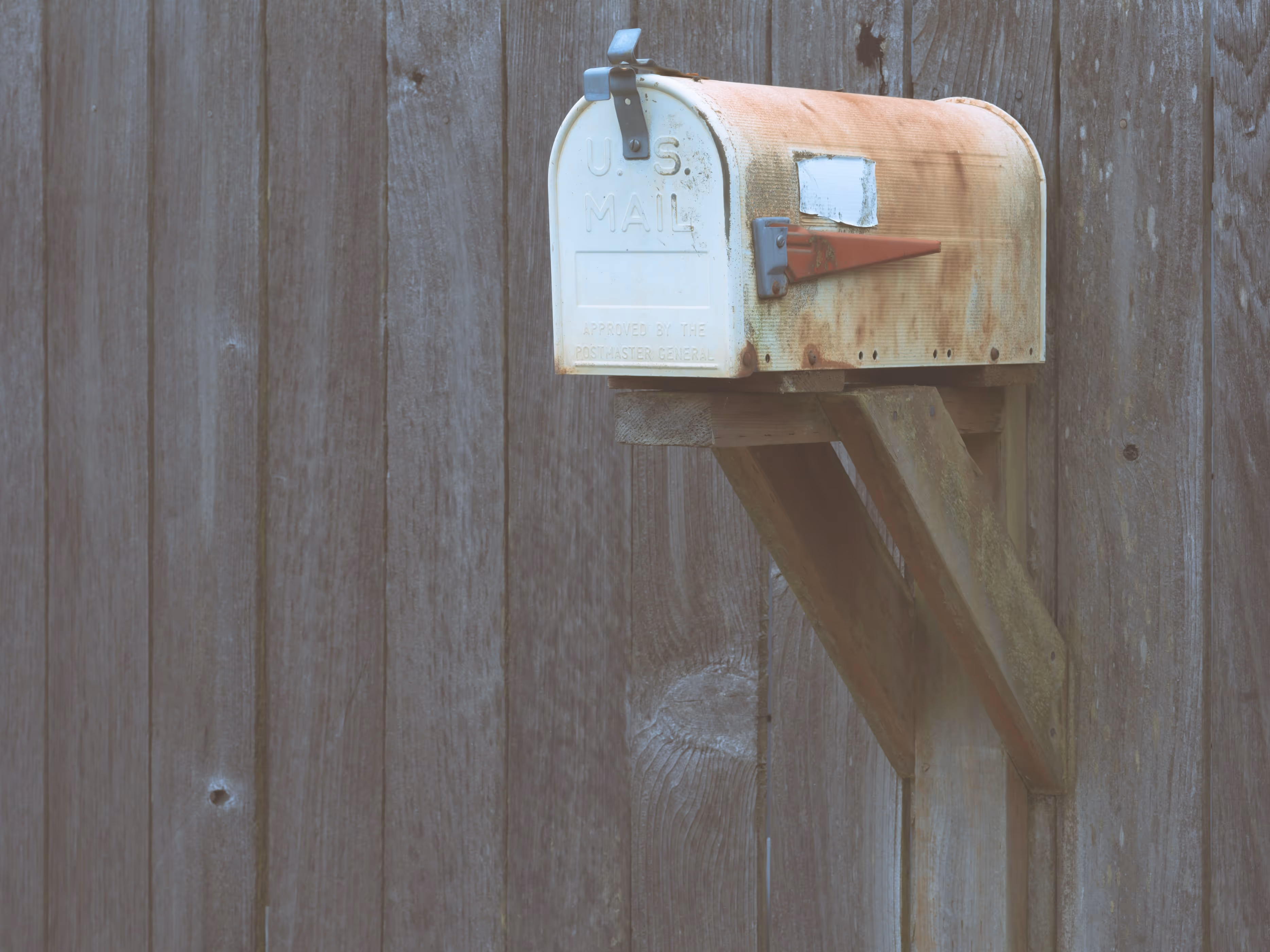 image of a classic old rusty mailbox