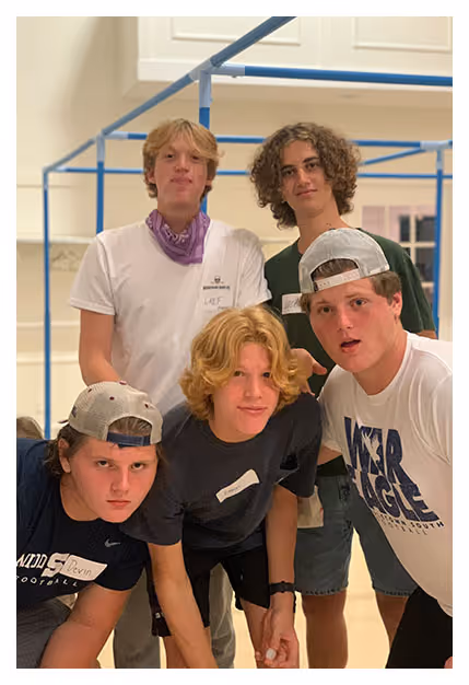 Photo of a group of boys posing in front of the camera at Tower Hill