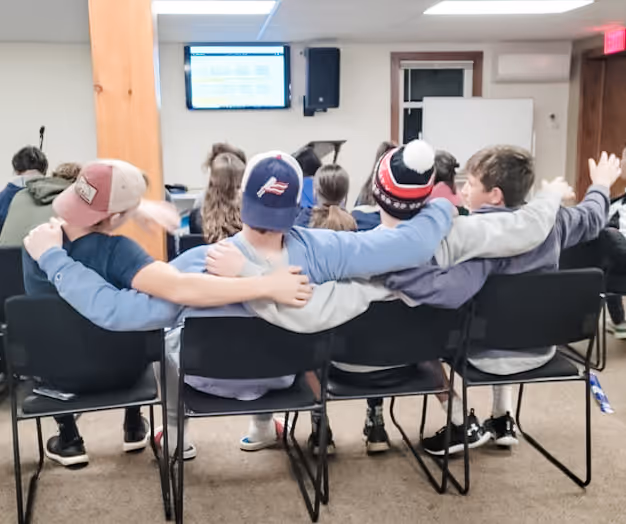 students attending a presentation at a group meeting at towerhill church