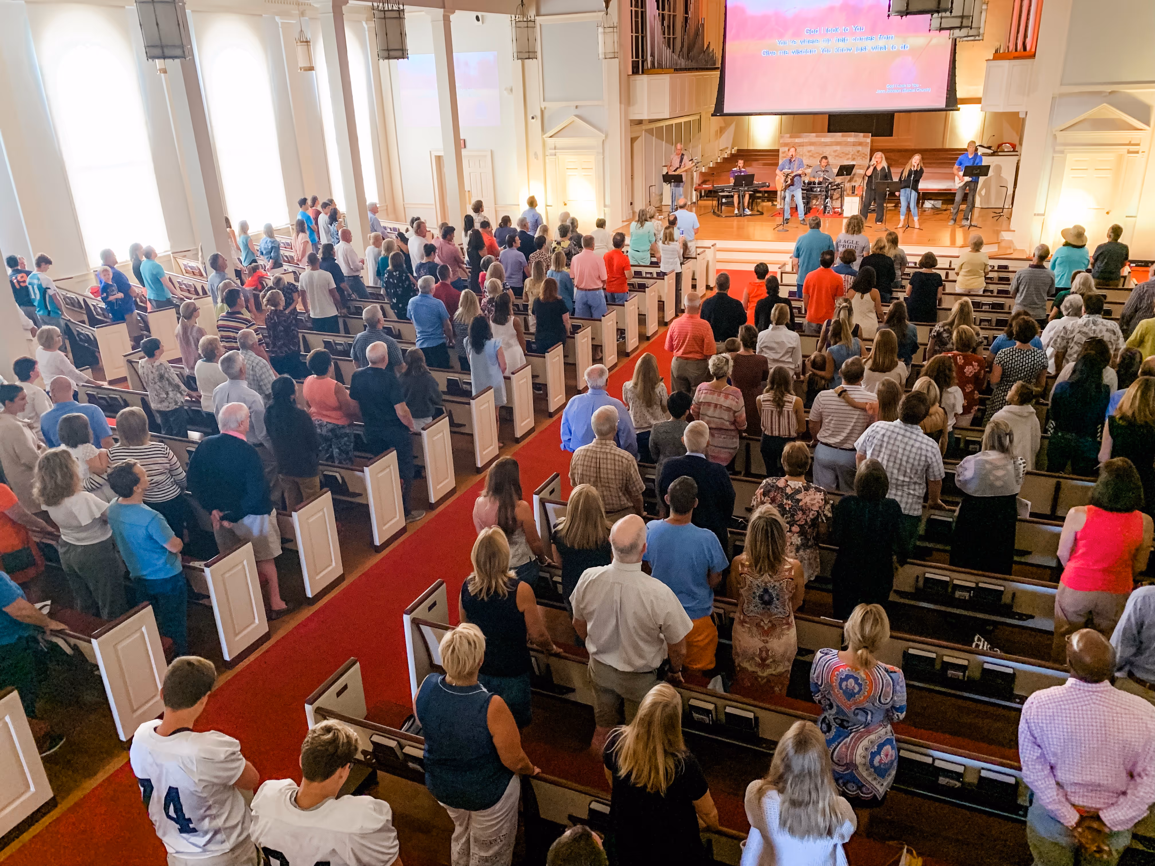 image of a church mebers watching live wroship at towerhill church