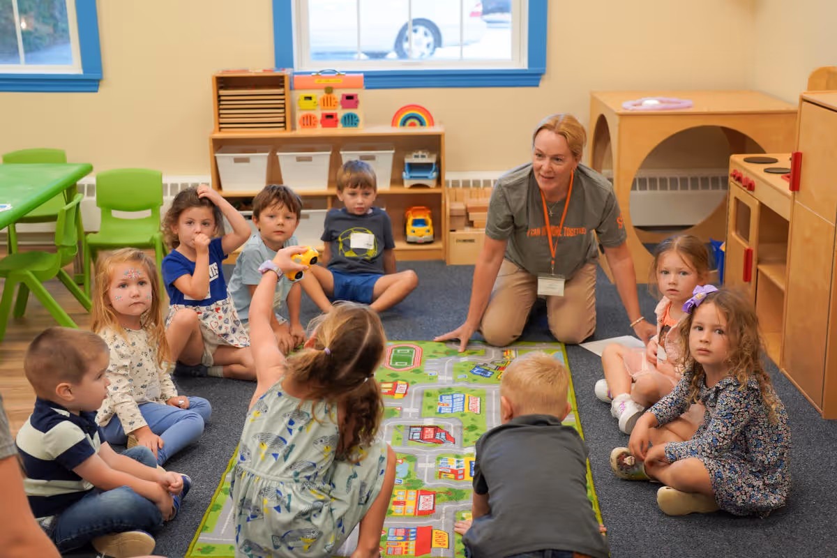 image of childern with their teacher during a volunteer event at towerhill church