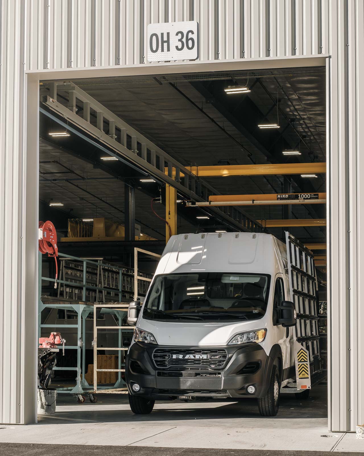 a van getting a glass rack installed
