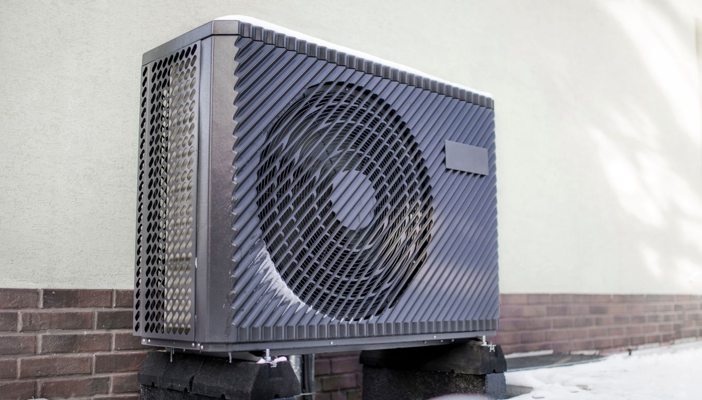 should i cover my air conditioner in the winter