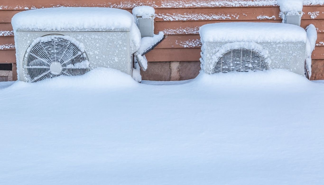 should i cover my air conditioner in the winter