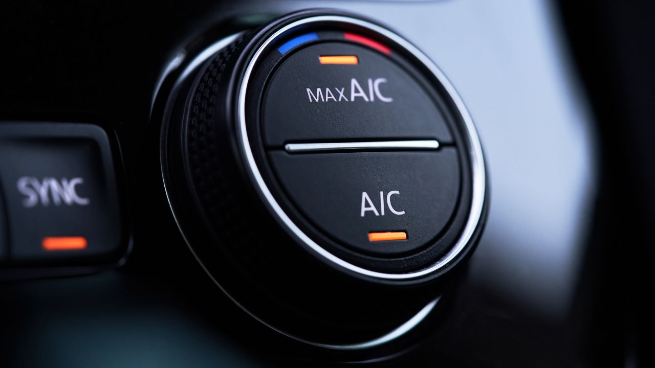 why is my car ac blowing warm air