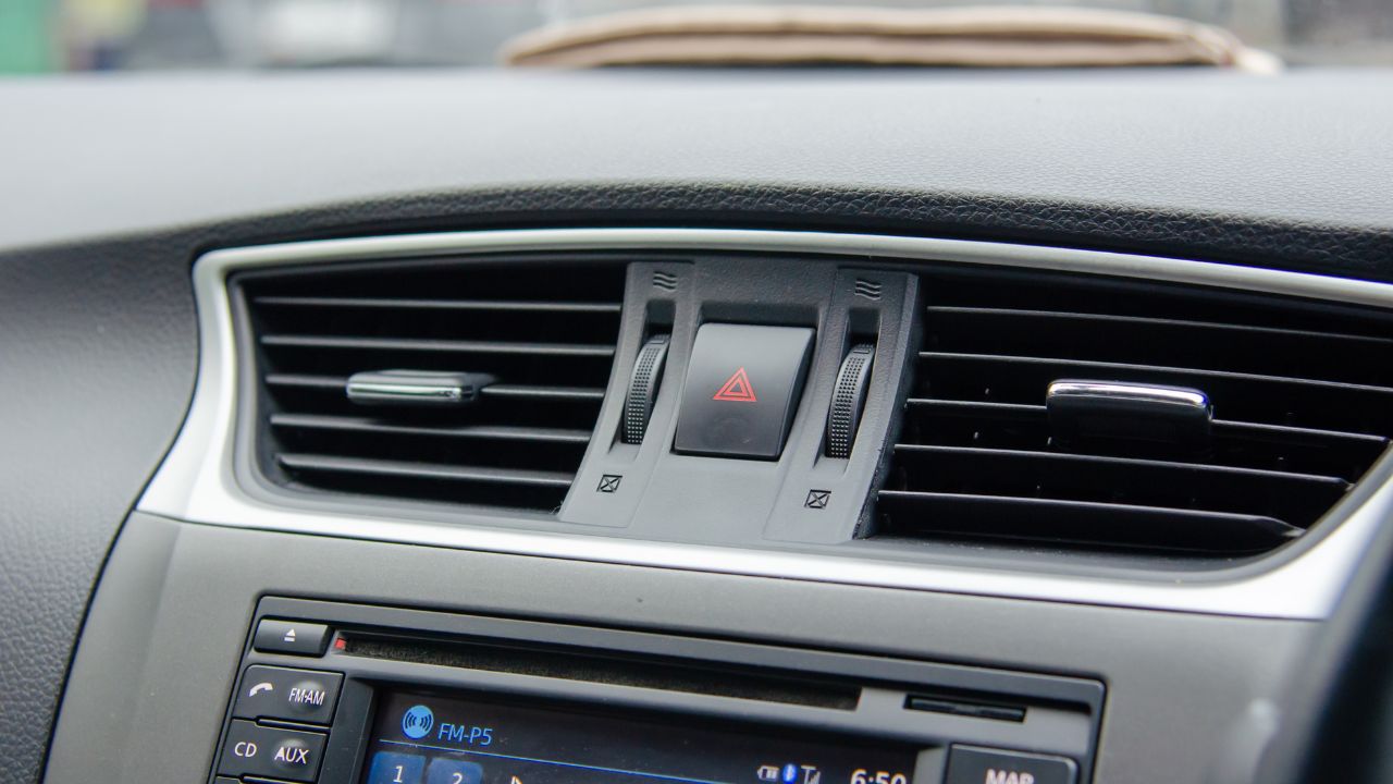 why is my car ac blowing warm air